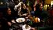 Women sit around a table in a cafe in Tehran Women sit around a table in a cafe in Tehran