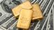 A representational image showing gold bars placed on $100 bills A representational image showing gold bars placed on $100 bills