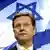 Çfarë pret Izraeli nga vizita e Gido Vesterveles? Ne foto: ministri i jashtem gjerman Vestervele me flamurin izraelit ne sfond