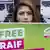 Ensaf Haidar hold sup a sign calling for the release of her husband, Raif Badawi