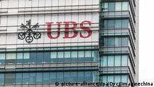 --FILE--A logo of Zurich-based financial services provider UBS Group is pictured on an office building in Shanghai, China, 4 December 2017. Zurich-based financial services provider UBS Group is still in discussion to acquire a major 51 percent stake in its Chinese securities joint venture, said the group's chief executive officer, Sergio P. Ermotti, in a telephone interview on Monday (22 January 2018). Ermotti said in an interview during the group's Greater China Conference 2018 held in Shanghai earlier this month that UBS will increase its stake in its joint venture in China šC UBS Securities Co Ltd šC from 49 percent to 51 percent. He said then that the acquisition would be a matter of months. The attempt by the Swiss financial services provider is in response to the Chinese central government's relaxed restrictions on foreign ownership in jointly-owned financial institutions announced in November. The cap will be completely abolished in three years. At present, State-owned Beijing Guoxiang Asset Management Co Ltd holds the major 33 percent stake in UBS Securities while UBS Group holds 24.9 percent. UBS said in 2016 that it will double its headcount in China to 1,200 within five years' time, hiring more staff in wealth management, investment banking, equities, fixed income and asset management businesses. Foto: Dycj/Imaginechina/dpa |