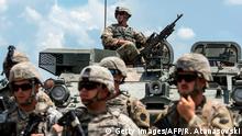 US soldiers take part in the 'Decisive Strike' military exercise in their camp at the Training Support Centre (TSC) Krivolak, near Skopje, on June 17, 2019. - The 'Decisive Strike' exercise is a national field exercise with several international participants, conducted at the Training Support Centre Krivolak. Around 2500 members of the armed forces from the following six countries will take part in the exercise: the Republic of North Macedonia land forces, air force and special forces, the United States of America (Pennsylvania National Guard, 19th Special Forces Group and US Air Force), Lithuania and Montenegro with artillery capabilities and special forces from Bulgaria and Albania. (Photo by Robert ATANASOVSKI / AFP) (Photo credit should read ROBERT ATANASOVSKI/AFP/Getty Images)