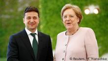 German Chancellor Angela Merkel welcomes Ukrainian President Volodymyr Zelenskiy at the Chancellery in Berlin, Germany, June 18, 2019. REUTERS/Hannibal Hanschke