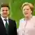 German Chancellor Angela Merkel stands next to Ukrainian President Volodymyr Zelenskiy