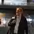Экс-глава УЕФА Мишель Платини покидает полицейский участок под Парижем, где он давал показания по делу о воозможной фальсификации итогов выбора страны-хозяйки ЧМ-2022