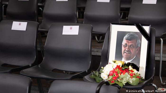 A picture of Walter Lübcke sits on a chair at a memorial in the Hesse state parliament
