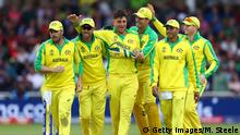 NOTTINGHAM, ENGLAND - JUNE 20: Marcus Stoinis (c) of Australia is congratulated by Glenn Maxwell, Alex Carey, Usman Khawaja and Steve Smith after David Warner took a catch to dismiss Shakib Al Hasan during the Group Stage match of the ICC Cricket World Cup 2019 between Australia and Bangladesh at Trent Bridge on June 20, 2019 in Nottingham, England. (Photo by Michael Steele/Getty Images)