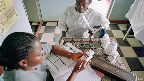 Woman receice HIV/Aids drugs in a clinic in Nigeria Woman receice HIV/Aids drugs in a clinic in Nigeria