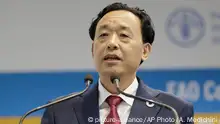 Qu Dongyu from China, one of the candidates for the Director-General position of the FAO (UN Food and Agriculture Organization), addresses a plenary meeting of the 41st Session of the Conference, at the FAO headquarters in Rome, Saturday, June 22, 2019. The new FAO Director-General will be voted on Sunday. (AP Photo/Andrew Medichini) |