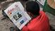 A man reads an Ethiopian newspaper A man reads an Ethiopian newspaper