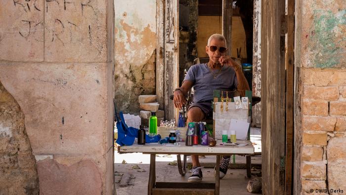 A man in front of his house in Cuba
