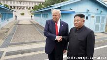 U.S. President Donald Trump meets with North Korean leader Kim Jong Un at the demilitarized zone separating the two Koreas, in Panmunjom, South Korea, June 30, 2019. REUTERS/Kevin Lamarque.