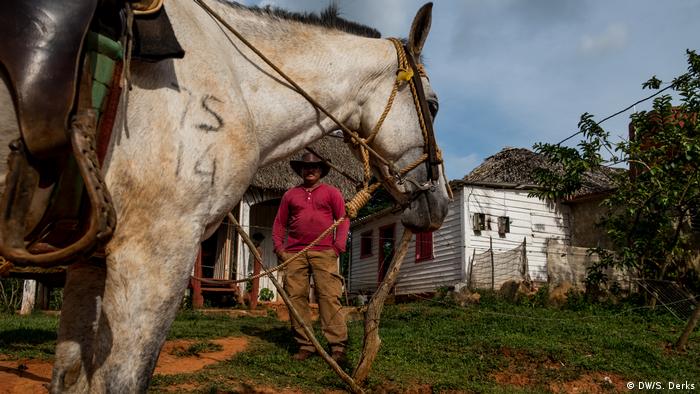 A Cuban farmer with his horse