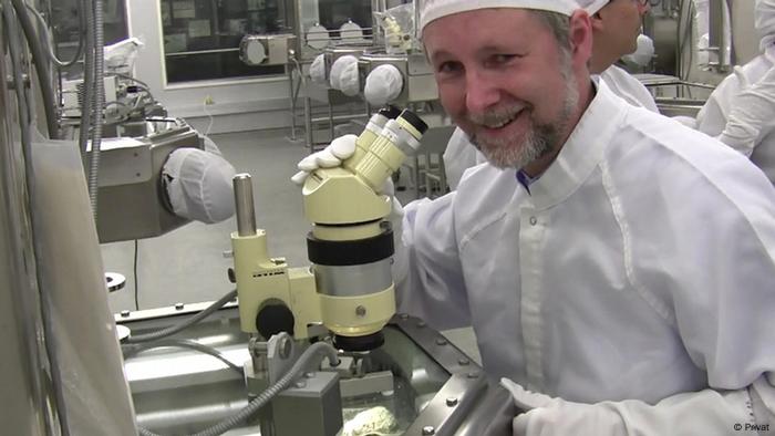 Colin Mackellar at the Pristine Sample Laboratory of the Lunar Curatorial Facility at the Johnson Space Center in Houston, looking at a sample of the The Genesis Rock from Apollo 15 (Private)
