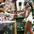 Venus Williams, Cori Gauff shaking hands at the net
