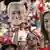 USWNT fans holding face cutouts of Megan Rapino and Carli Lloyd