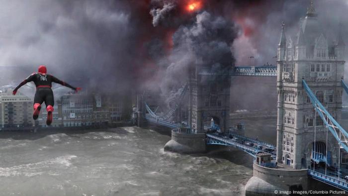 In a still from Far from Home, Spider-Man flies over London Bridge.