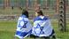 Two young women draped in Israeli flags in Auschwitz Two young women draped in Israeli flags in Auschwitz