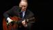 Brazilian musician Joao Gilberto playing the guitar Brazilian musician Joao Gilberto playing the guitar