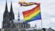 A rainbow flag in front of the cathedral in Cologne, Germany A rainbow flag in front of the cathedral in Cologne, Germany