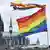 A rainbow flag in front of the cathedral in Cologne, Germany