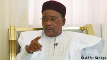 06.07.2019 Niger's President Mahamadou Issoufou speaks during an interview at the presidential palace in Niamey, on July 6, 2019. - The launch of an African Continental Free Trade Area (AfCFTA) will be the focus of the two-day summit in the capital Niamey. Heads of state will meet for an African Union (AU) summit in Niger on July 7 to usher in a landmark free trade agreement and consider looming security and migration crises. (Photo by ISSOUF SANOGO / AFP)