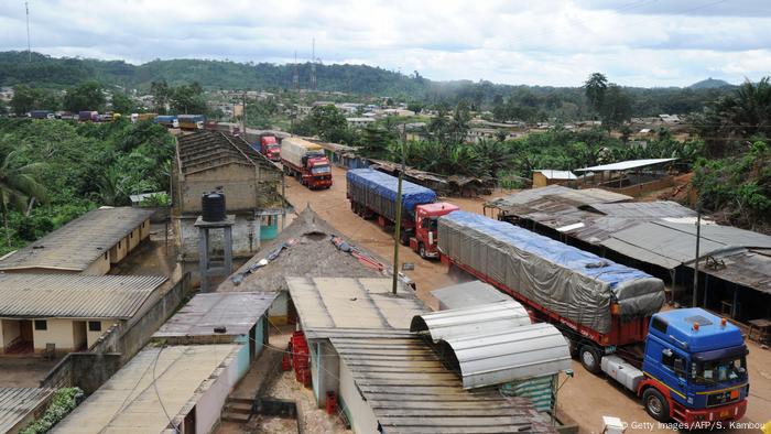 The border between Ivory Coast and Ghana, with several freight trucks