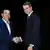 Kyriakos Mitsotakis, el nuevo primer ministro de Grecia (der.) y Alexis Tsipras, el predecesor.