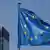 EU Flagge vor Hochhäusern