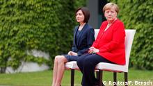 German Chancellor Angela Merkel and Moldova's Prime Minister Maia Sandu sit during a welcoming ceremony at the Chancellery in Berlin, Germany July 16, 2019. REUTERS/Fabrizio Bensch