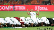 July 19, 2019***
Soccer Football - Africa Cup of Nations 2019 - Final - Senegal v Algeria - Cairo International Stadium, Cairo, Egypt - July 19, 2019 Algeria's Yacine Brahimi and team mates celebrate in front of their fans after winning the Africa Cup of Nations REUTERS/Suhaib Salem