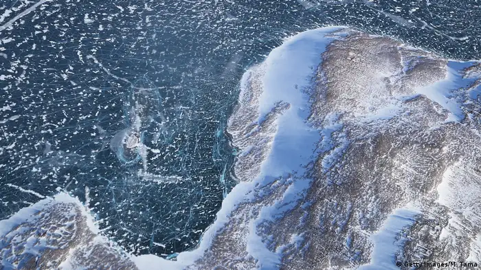 Sea ice meets land as seen from NASA's Operation IceBridge research aircraft along the Upper Baffin Bay coast 