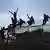Migrantes saltan la valla fronteriza de Melilla. (Archivo).