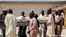 26.7.2019***
EDITORS NOTE: Graphic content / Men carry dead bodies during a burial ceremony, after two people were killed by Boko Haram fighters in Dalori camp for internally displaced people, near Maiduguri, on July 26, 2019. - Two people were killed and several wounded when Boko Haram fighters raided a camp for people displaced by the jihadist conflict in northeast Nigeria, emergency services said on July 26, 2019. Dozens of Islamist militants on motorcycles and two motorised rickshaws stormed into Dalori camp on Thursday, shooting people and looting food supplies after overrunning a nearby military base. (Photo by Audu MARTE / AFP)