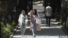 July 11, 2019 - Tehran, Tehran, IRAN - People walk in the Ferdows garden in Tehran, Iran. (Credit Image: Â© Rouzbeh Fouladi/ZUMA Wire |