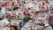 August 3, 2019
South Korean people chant slogans during an anti-Japan rally near the Japanese embassy in Seoul, South Korea, August 3, 2019. The banners read Condemn Abe regime. Make an official apology to victims of wartime forced labor. REUTERS/Kim Hong-Ji TPX IMAGES OF THE DAY