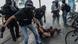 Police arrest a man during an August 3 gathering in Nantes protesting the death of 24-year-old Steve Maia Canico. Police arrest a man during an August 3 gathering in Nantes protesting the death of 24-year-old Steve Maia Canico.