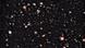 Picture containing many galaxies, the faintest and reddest ones being the most distant Picture containing many galaxies, the faintest and reddest ones being the most distant
