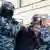 Здержание полицией одного из участников протестов в Москве