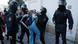 Russian protester Daria Sosnovskaya struggles with law enforcers Russian protester Daria Sosnovskaya struggles with law enforcers