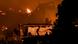 Flames engulf a Dhaka slum Flames engulf a Dhaka slum
