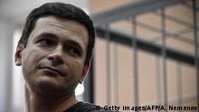 08.08.2019 *** Opposition member Ilya Yashin looks on as he attends court hearings in Moscow on August 8, 2019. - Yashin was sentenced for another 10 days in jail after 10 days of detention for unauthorised demonstration. (Photo by Alexander NEMENOV / AFP) (Photo credit should read ALEXANDER NEMENOV/AFP/Getty Images)