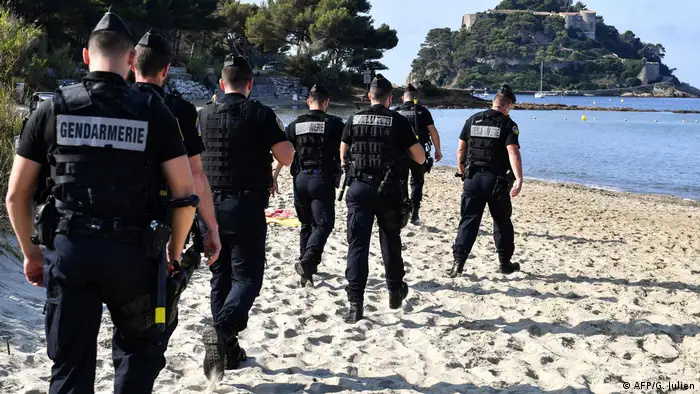 French Gendarmes patrol the beach in Biarritz