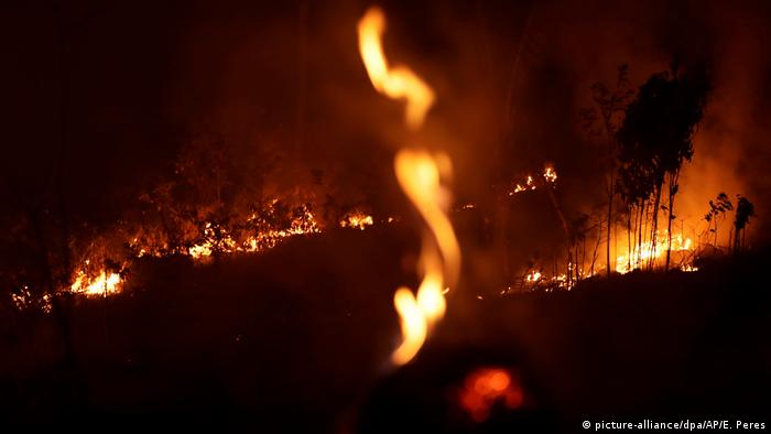 A nightime shot of the Amazon rainforest burning