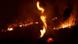 A nightime shot of the Amazon rainforest burning A nightime shot of the Amazon rainforest burning