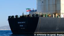 TOPSHOT - An Iranian flag flutters on board the Adrian Darya oil tanker, formerly known as Grace 1, off the coast of Gibraltar on August 18, 2019. - Gibraltar rejected a US demand to seize the Iranian oil tanker at the centre of a diplomatic dispute as it prepared to leave the British overseas territory after weeks of detention. (Photo by Johnny BUGEJA / AFP) (Photo credit should read JOHNNY BUGEJA/AFP/Getty Images)