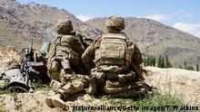.In this photo taken on June 6, 2019, US soldiers look out over hillsides during a visit of the commander of US and NATO forces in Afghanistan General Scott Miller at the Afghan National Army (ANA) checkpoint in Nerkh district of Wardak province. - A skinny tangle of razor wire snakes across the entrance to the Afghan army checkpoint, the only obvious barrier separating the soldiers inside from any Taliban fighters that might be nearby. (Thomas Watkins/AFP/Getty Images/TNS) Photo via Newscom picture alliance |