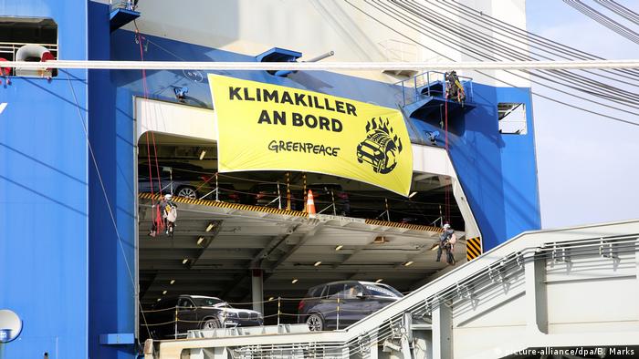 Greenpeace activists dubbed SUVs 'climate killers'