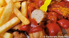 Typical German Currywurst (curried sausage) is pictured in Berlin, Germany, September 3, 2019. Picture taken September 3, 2019. REUTERS/Hannibal Hanschke