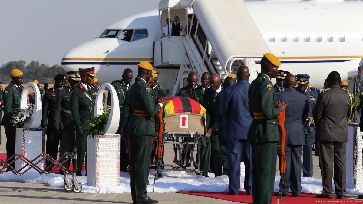 Mugabe's Body Returns To Divided Zimbabwe – DW – 09/12/2019